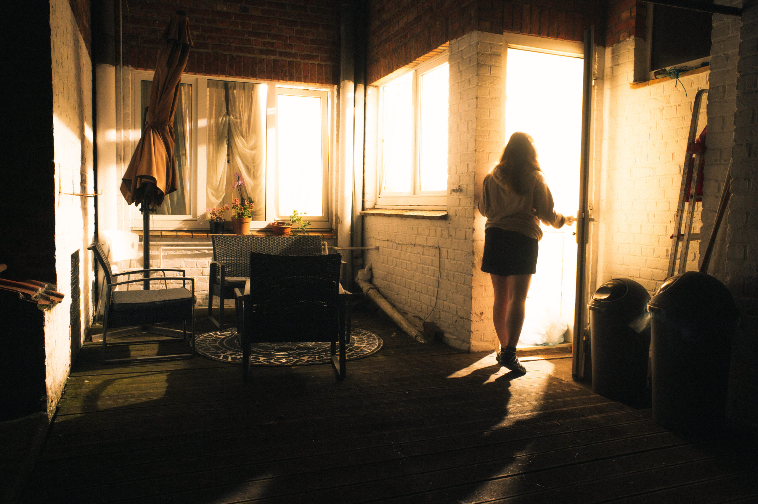 Young Lady heading towards the Light of a House